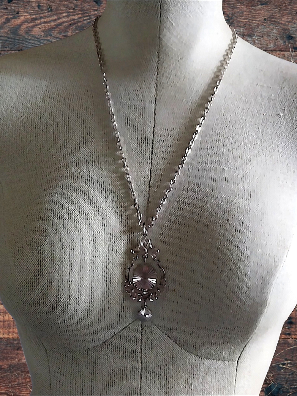 Silver Long Pendant Necklace with Ornate Medallion